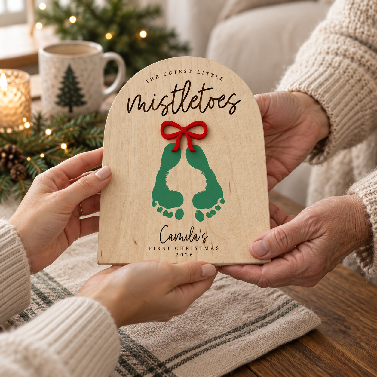 A personalised footprint keepsake being gifted to a grandparent